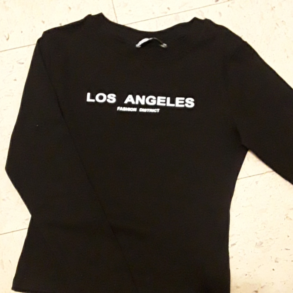 This is a cropped long sleeve